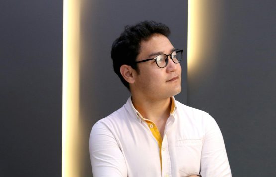 Photo by Usen Parmanov man in white dress shirt wearing black framed eyeglasses
