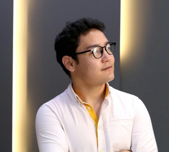 Photo by Usen Parmanov man in white dress shirt wearing black framed eyeglasses