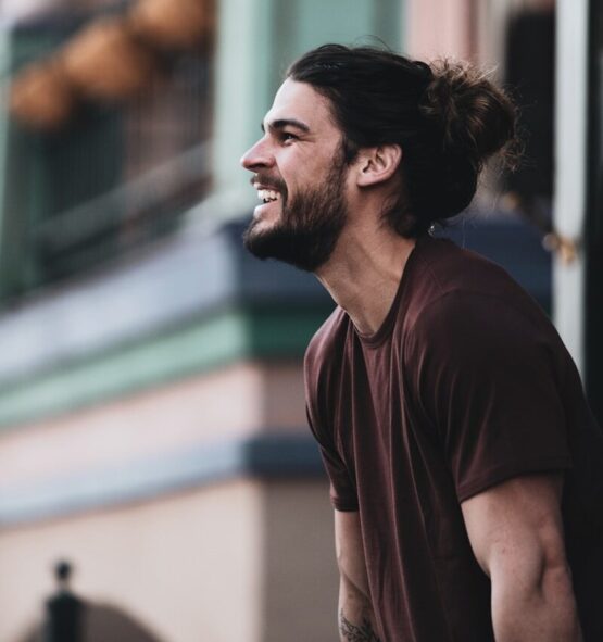 Photo by LOGAN WEAVER | @LGNWVR man in brown crew neck shirt